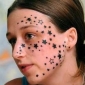 Girl Sues for Stars Tattoo All Across Her Face