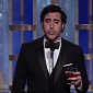 Golden Globes 2013: Sacha Baron Cohen Jokes About Anne Hathaway’s Red Carpet Flash