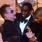 Golden Globes 2014: Diddy and Bono’s Super Awkward Hug