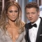 Golden Globes 2015: Jeremy Renner Can’t Take His Eyes Off Jennifer Lopez’s Cleavage – Video