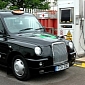 Green Olympic Taxis Taken to Refueling Station by Diesel Trucks