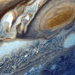 Helium Rains Cover Jupiter in Neon