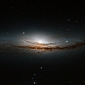 Hubble Sees Edge-on View of Beautiful Spiral Galaxy Nearby