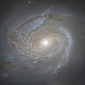 Hubble Sees Majestic Spiral Galaxy NGC 4911