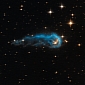 Hubble Sees a Gorgeous Cosmic Caterpillar Being Pulled Apart by Star Radiation