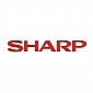Huge Losses Force Sharp to Fire 5,000 People