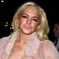 Hugh Hefner Is Not Happy with Lindsay Lohan's Playboy Spread