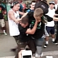 Huntington Beach Riot Video Shows Brawls, Police Charging Rioters