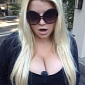 Jessica Simpson Shows Off Massive Cleavage in First Twitter Photo After Baby