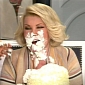 Joan Rivers Attacked with Cake on the Red Carpet, Photos Confirm
