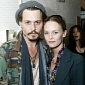 Johnny Depp Denies Rumors of Split from Vanessa Paradis