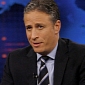 Jon Stewart Rips the NRA for Obama Ad