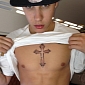Justin Bieber Hopes for Highest Altitude Tattoo Record with New Ink at 40,000 Feet – Photo