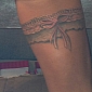 Katie Price Shows Off New Garter Tattoo on Her Thigh