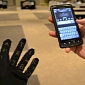 Keyboard Gauntlet for Phones and Wearable Displays Demonstrated
