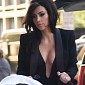 Kim Kardashian Gives Cleavage a Whole New Meaning on Lunch Date in NYC – Photos