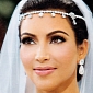 Kim Kardashian Now Says She Plans a “Super Small Intimate” Wedding