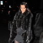 Kim Kardashian Shows Off Baby Bump, Struts in Tight Dress, Fur Coat