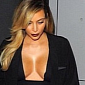 Kim Kardashian Shows Off Massive Cleavage in Givenchy at Paris Fashion Week