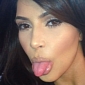 Kim Kardashian Shows Off Post-Baby Skin in Keek Video, Sticks Tongue Out