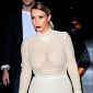 Kim Kardashian Shows Off Slim Figure in Mesh, See-Through Top – Photo