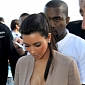Kim Kardashian Steps Out with Baby North West for the First Time Since Giving Birth