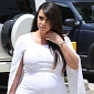 Kim Kardashian Steps Out with Painfully Swollen Feet in Heels – Photos