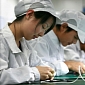 Labor Group Slams NY Times Report on Apple, Foxconn