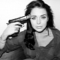 Lindsay Lohan Criticized for Posing with Gun, Mocking Suicide