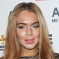Lindsay Lohan Shows Off “Pillow Face” on the Red Carpet