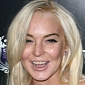 Lindsay Lohan’s Rep Comments on Her Rotting Teeth
