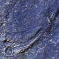 MRO Images Show Channels Near a Crater