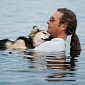 Man Swims with Arthritic Dog, Hopes to Ease the Animal's Pain
