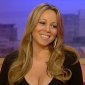Mariah Carey Needs 2 People to Lower Her on Talk Show Sofa