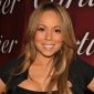 Mariah Carey Shows Off Painted Baby Bump