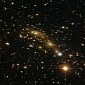 Mass of Distant Galaxy Cluster Is 160 Trillion Times That of Our Sun