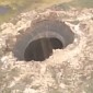 Massive 270-Foot (82.3-Meter) Hole Opens Up Out of the Blue in Siberia