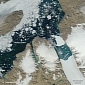 Massive Iceberg from Greenland Moves Down Fjord