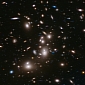 Massive Star Cluster Doubling as Galactic Lens – Photo