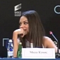 Mila Kunis Schools Reporter at Press Conference – In Russian