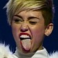 Miley Cyrus Flips Out at Woman Telling Her to Put Her Tongue Back in Her Mouth