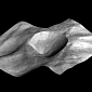 NASA Spacecraft Images New Landscape Features on Vesta