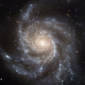 New Theory on How Spiral Galaxies Got Their Arms