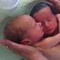 Newborn Twins Hug While Bathing, Just like They Did in the Womb