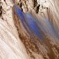 Newly Discovered Blue Landslides on Mars