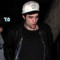 Pattinson Emerges for Bobby Long Concert Date with Stewart