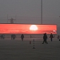 People in Beijing Switch to Watching Sunrises, Sunsets on TV Screens