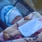 Photo of Infant Left Alone with Note Prompts Investigation into Mother's Identity
