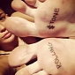 Photo of the Day: Miley Cyrus Gets Rolling Stone Tattoo on Her Feet