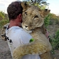 Picture of the Day: Lioness Hugs Man Who Rescued Her as a Cub